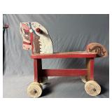 Handcrafted wooden ride-on horse toy