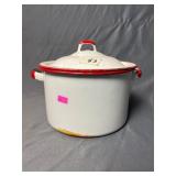Vintage white enamelware pot with red trim