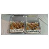 Two packs of 2 aluminum cookie sheets