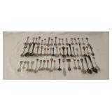 Large assortment of souvenir spoons