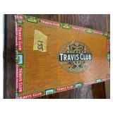 Travis club box containing a variety of keychains