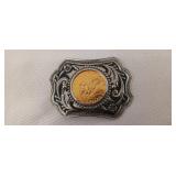 Silver toned Western style belt buckle with
