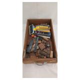 Assorted ink stamps and fountain pen refills