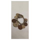 Bracelet with assorted foreign coins