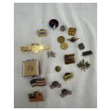 Collection of vintage pins and fobs