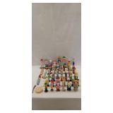 Large assortment of hand carved wood figurines