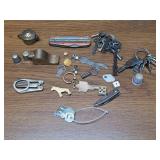 Keys, thimbles, pocket knife, earrings, dice