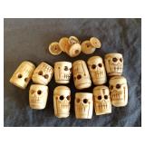 Carved bone beads, tops are detached