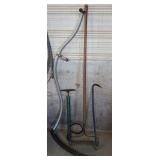 Hand scythe, tire pump, rake, crow bar