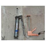 Grease gun, caulking gun