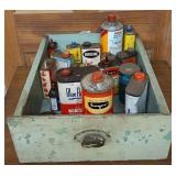 Advertising tins, some still have liquid in them