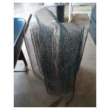 Four small rolls of garden fence