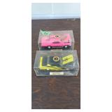 Two diecast collector cars in cases 1970 Buick gsx