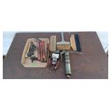Road flares, antique hardware, grease gun,