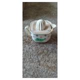 Antique ceramic juicer on pitcher