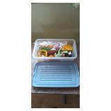 Tote of assorted cake decorations