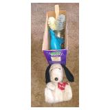 Snoopy plush doll, cleaning brushes, misc.