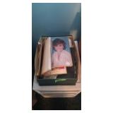 Assortment of office supplies and books