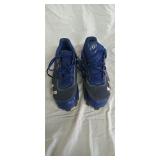 Pair of mens size 11 under armor baseball cleats