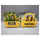 Two vintage plastic pepsi bottle carriers, with