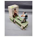 Vintage cast iron soccer coin bank