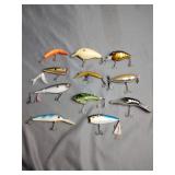 11 Assorted fishing lures inc, heddon pop'n image,