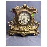 Mantle clock w/ ornate gold-painted metal case