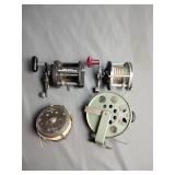 4 Vintage fishing reel,daiwa saline graphite frame