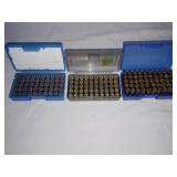 3 cases of spent brass casings ready for reloading