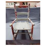 Vintage childs rocking chair with wicker seat