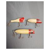 Three vintage wooden fishing lures