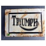 Triumph metal sign