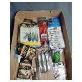 Assorted new fishing lures and baits, hooks