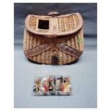 Vintage wicker creel with fly lure assortment