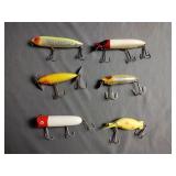 5 vintage Heddon fishing lures and one vintage