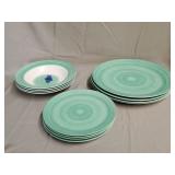 12- Green and white plastic dishes