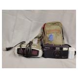 Pentax camera with case and film, alarm clock