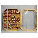 Decor cabinet with raisinette figurines, trinkets