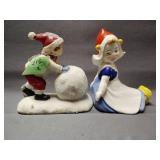 Two ceramic figurines, one is erphila made in