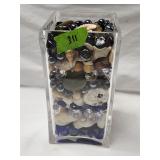 Plastic Vase Filled with Misc Items 8.5'H
