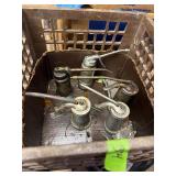 5- Vintage Oil Cans in Plastic Milk Crate