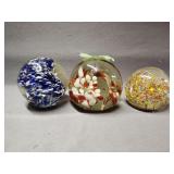 3 unmarked glass paperweights