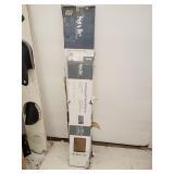 Two boxes of vinyl plank flooring