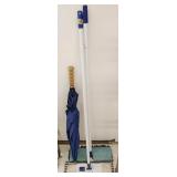 2 Dust mops and umbrella