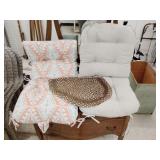 Patio chair cushions and woven rug