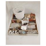 Assortment of screws, bolts, hardware, and