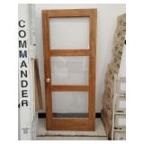 Wood entry door with glass windows