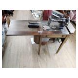 White rotary sewing machine and stand,