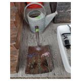 Galvanized watering can and painted shovel head