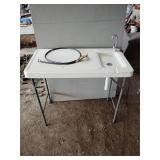 Fish cleaning table 43' x 23' x 36'